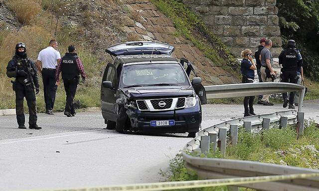 European Union police officers secure the site near Kosovo's town of Zvecan where one of their colleagues was shot dead