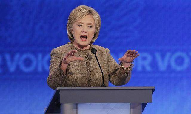 Democratic U.S. presidential candidate Clinton responds to a question about the potential use of U.S. ground troops to fight Islamic State during the Democratic presidential candidates debate at St. Anselm College in Manchester