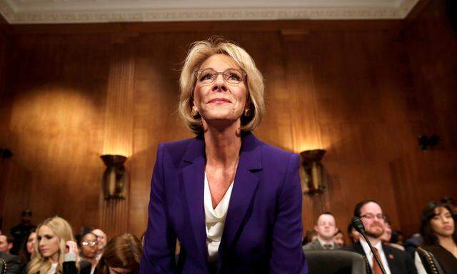 FILE PHOTO - Betsy DeVos arrives at the Senate Health, Education and Labor Committee confirmation hearing to be next Secretary of Education on Capitol Hill in Washington