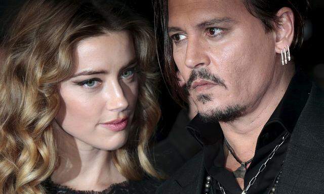 Cast member Johnny Depp and his actress wife Amber Heard arrive for the British premiere of the film ´Black Mass´ in London