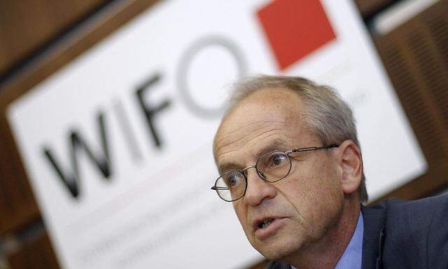 Head of Austria's economic research institute WIFO Aiginger attends a news conference in Vienna