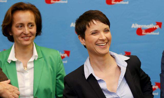 Petry, chairwoman of the anti-immigration party Alternative for Germany, smiles as she delivers a speech after first exit polls in three regional state elections at the AfD party´s election night party in Berlin