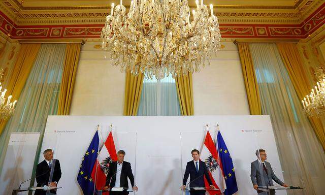 Austria's Chancellor Kurz, Vice Chancellor Kogler, Interior Minister Nehammer and Health Minister Anschober address the media in Vienna