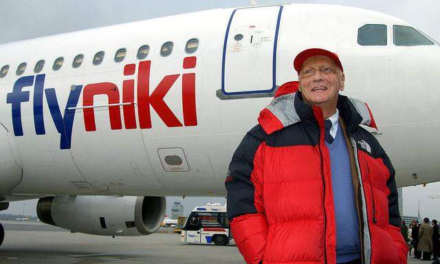 FILE PHOTO:  Former Formula One World Champion Niki Lauda poses for photographers in front of an airbus A320 at Vienna's Airport