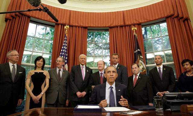 President Barack Obama talks to the media before signing S. 1890 Defend Trade Secrets Act of 2016