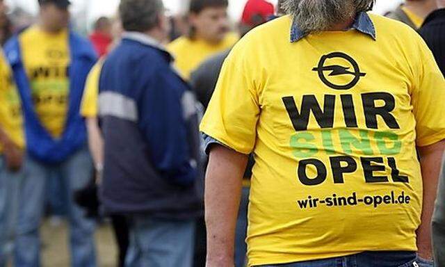 Opel workers from several countries in Europe take part in a demonstration outside the Opel assembly 