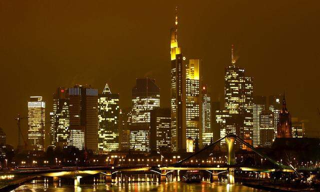 FILE PHOTO: The famous skyline with its banking district is pictured in early evening next to the Main River in Frankfurt, Germany