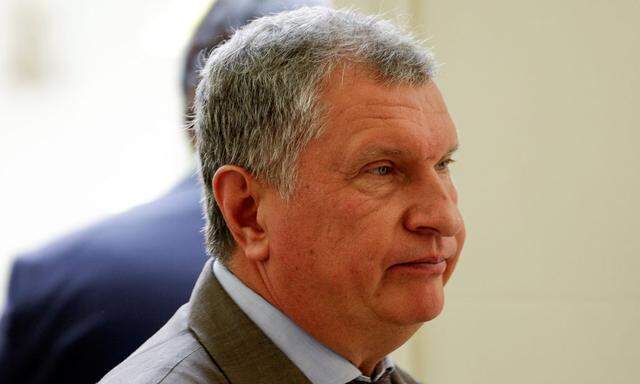 Head of Russian state oil firm Rosneft Sechin leaves after an agreement signing ceremony with Venezuela's President Maduro in Caracas