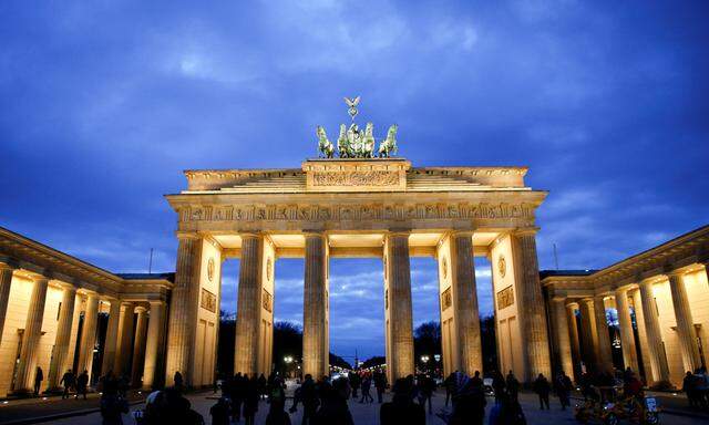 The Brandenburg Gate is seen during sunset in Berlin