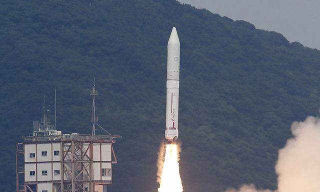 An Epsilon rocket blasts off from the launching pad at the Uchinoura Space Center in Kimotsuki town, Kagoshima prefecture