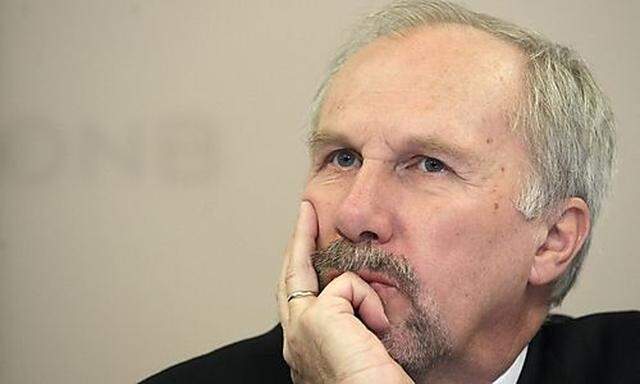 OeNB governor Nowotny briefs the media during a news conference in Vienna