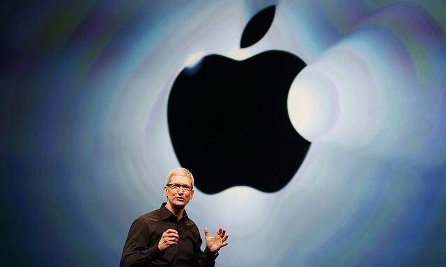 Apple Inc. CEO Tim Cook takes the stage during Apple Inc.'s iPhone media event in San Francisco