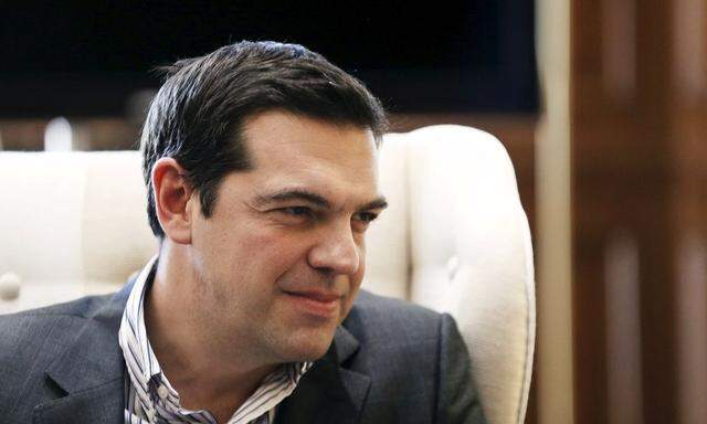 Greek PM Tsipras listens to Russian Gazprom CEO Miller during meeting in Athens 