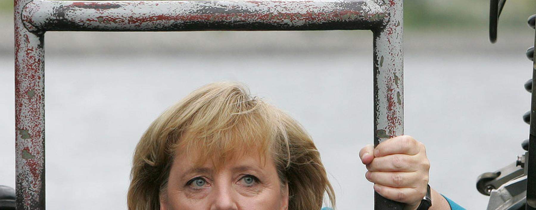 German Chancelor Angela Merkel enters German navy submarine in Warnemuende near Rostock