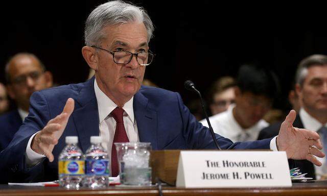 FILE PHOTO: Federal Reserve Board Chairman Jerome Powell testifies on Capitol Hill in Washington DC