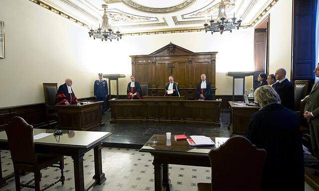 File photo of Pope Benedict's former butler Gabriele listening to the court at the Vatican