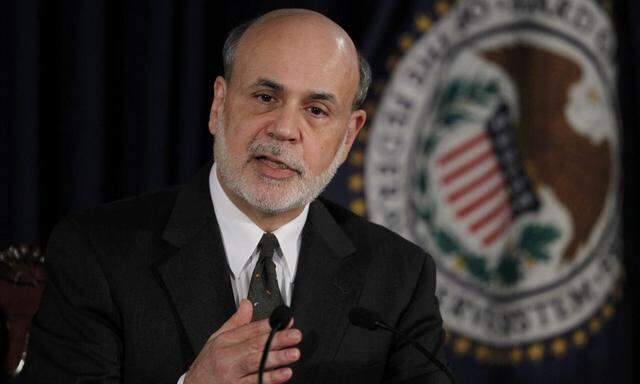 U.S.Federal Reserve Chairman Bernanke speaks to the press at the Federal Reserve in Washington