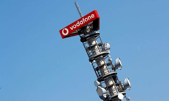 FILE PHOTO: Different types of 4G, 5G and data radio relay antennas for mobile phone networks are pictured on a relay mast operated by Vodafone in Berlin