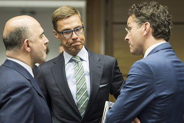 Skeptisch Blicke: EU-Kommissar Pierre Moscovici aus Frankreich, Finnlands Finanzminister Alexander Stubb, der am Samstag die Rolle des zweiten Hardliners neben Wolfgang Schäuble einnahm, und Eurogruppenchef Jeroen Dijsselbloem.