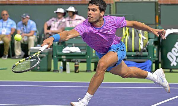 Mar 17, 2024; Indian Wells, CA, USA;  Carlos Alcaraz (ESP) hits a shot as he defeated Daniil Medvedev (RUS) in the men’s final of the BNP Paribas open at the Indian Wells Tennis Garden. Mandatory Credit: Jayne Kamin-Oncea-USA TODAY Sports