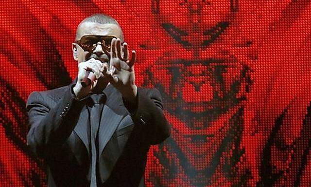 Singer George Michael performs at the Albert Hall in London