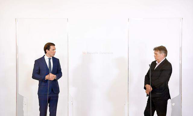 Austrian Chancellor Kurz and Vice-Chancellor Kogler attend a news conference during the coronavirus disease (COVID-19) outbreak in Vienna