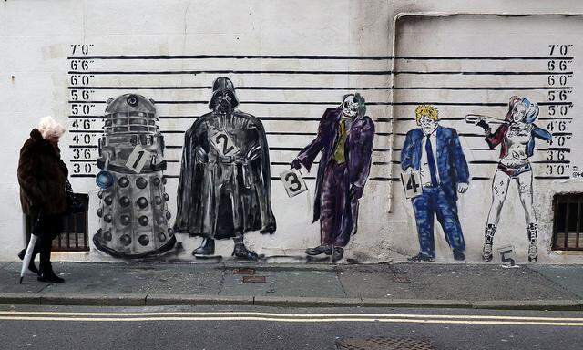 Die britische Regierung will die EU das Fürchten lehren – so wie dieses Graffito in London, das Boris Johnson in einer Reihe von Bösewichten zeigt.  