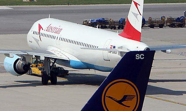 FILE - In this July 2, 2009, planes of Austrian Airlines, AUA, and Lufthansa stand at Vienna-Schwecha