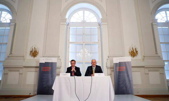 Austrian Justice Minister Josef Moser and Secretary General Christian Pilnacek attend a news conference in Vienna