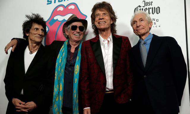 The Rolling Stones pose as they arrive for the opening of the new exhibit ´Exhibitionism: The Rolling Stones´ in New York