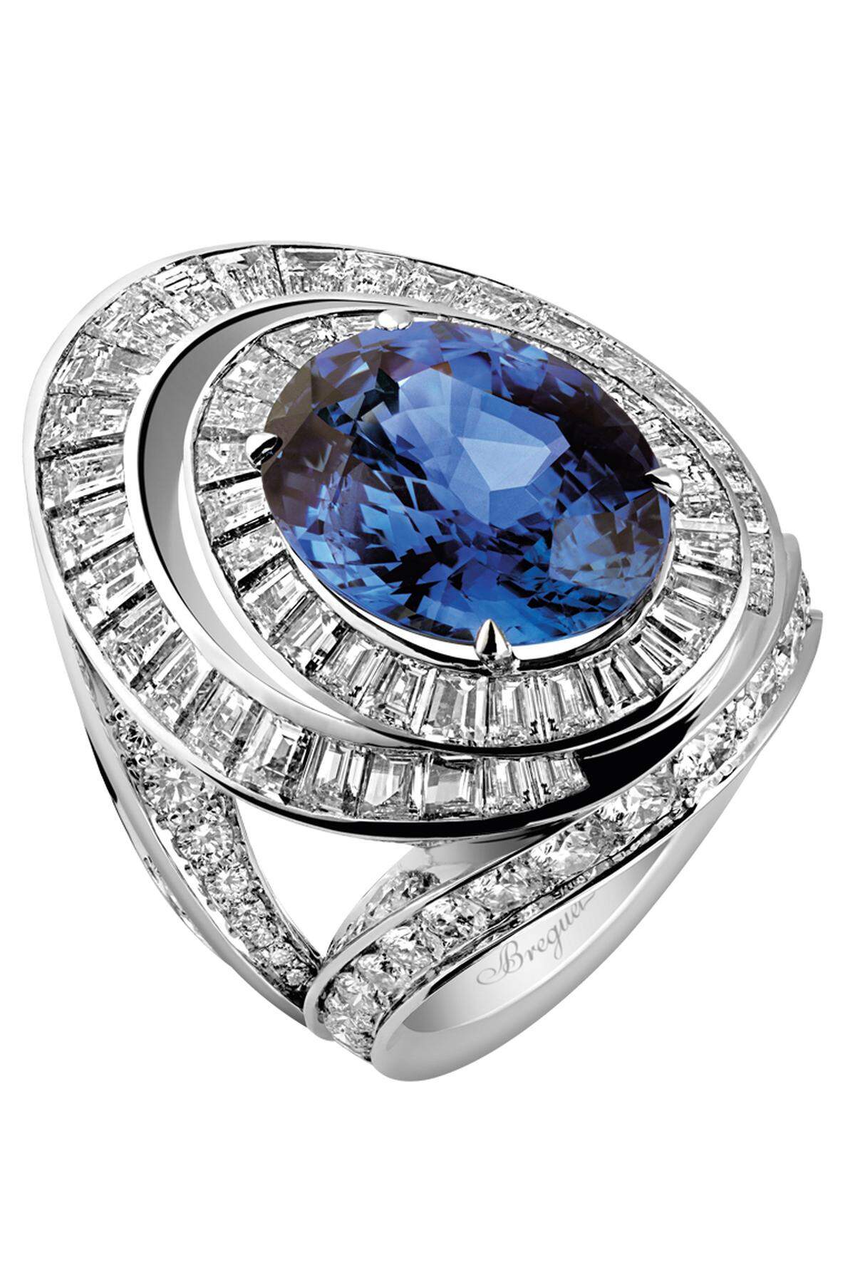 „Reine de Naples“ aus Platin 950, mit Brillanten, 2,48 ct., Diamanten im Baguetteschliff, etwa 7,50 ct., und einem ovalen blauen Saphir, 9,50 ct.