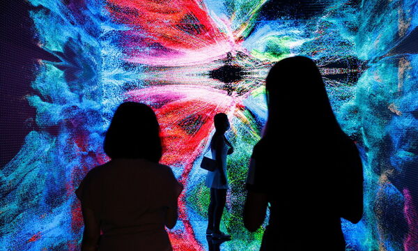 Visitors are pictured in front of an art installation which will be converted into NFT and auctioned online at Sotheby's, in Hong Kong