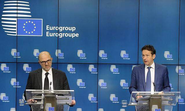 EU-Kommissar Moscovici and Eurogruppen-Chef Dijsselbloem bei der Pressekonferenz.