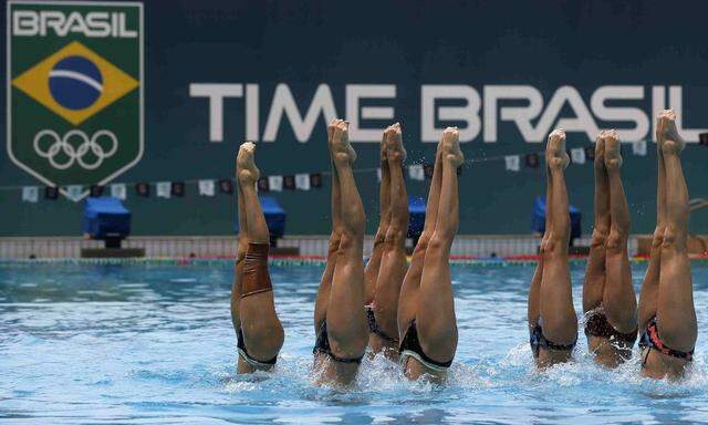 Members of the Russian synchronized swimming team attend a training camp at the Maria Lenk Aquatic Center in Rio de Janeiro