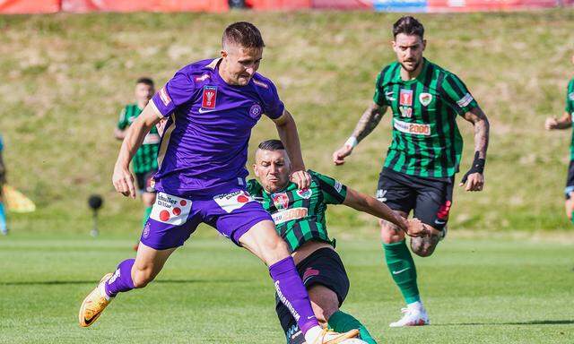 Reinhold Ranftl (FK Austria Wien), Medi Sulimani (Wels FC) während der 1. Runde im Uniqa ÖFB Cup zwischen FC Wels und FK Austria Wien.