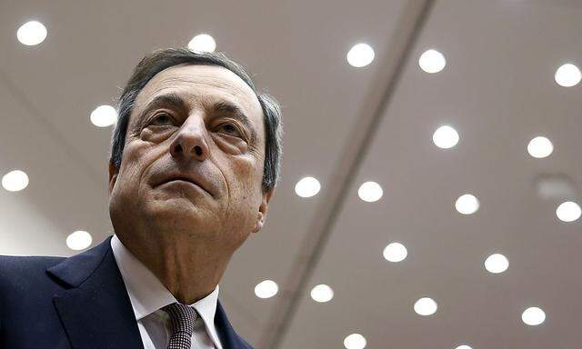 ECB President Draghi arrives to take part in a plenary debate on the ECB´s Annual Report 2013 at the EU Parliament in Brussels