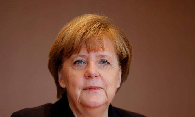 German Chancellor Merkel attends the cabinet meeting at the Chancellery in Berlin