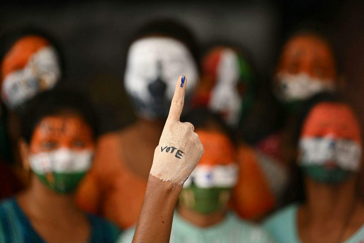 19. März. Vor den Wahlen in Indien machen Studenten Jugendliche auf ihr Wahlrecht aufmerksam.