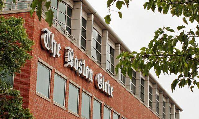 FILE PHOTO: Boston Globe's logo is seen on newspaper's building in Boston