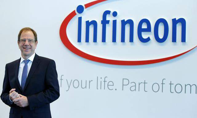 Ploss, CEO of German semiconductor manufacturer Infineon poses before annual news conference in Munich
