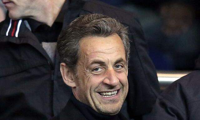 Former French President Sarkozy attends the Paris Saint-Germain French Ligue 1 soccer match against Montpellier at the Parc des Princes Stadium in Paris