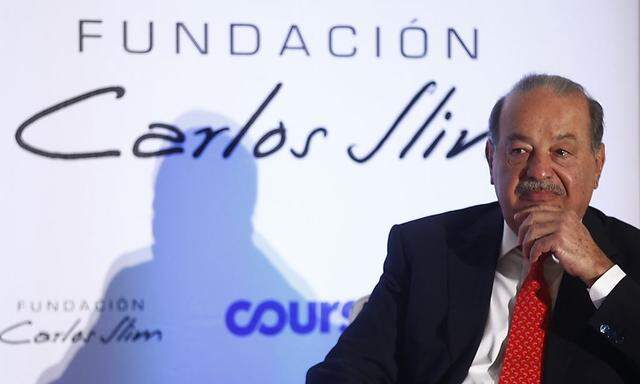 Mexican billionaire Carlos Slim attends a presentation of a digital platform inside Soumaya museum in Mexico City