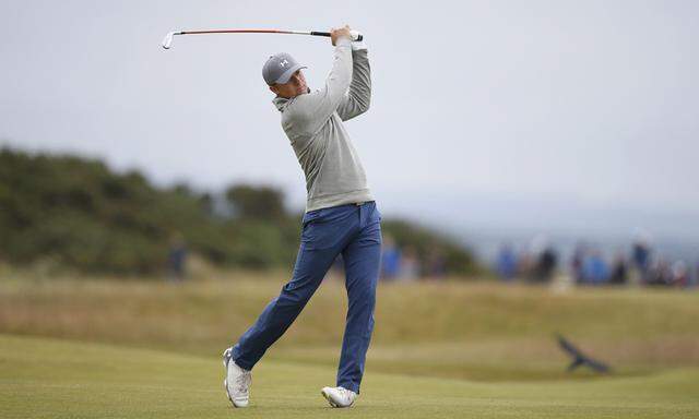 Spieth of the U.S. plays his approach on the 14th hole during a practice round ahead of the British Open golf championship on the Old Course in St. Andrews, Scotland