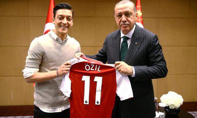 Turkish President Erdogan meets with Arsenal's soccer player Ozil in London