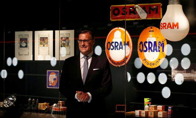 FILE PHOTO: CEO of lamp manufacturer Osram Olaf Berlien poses during opening of company 'World of light' showroom in Munich