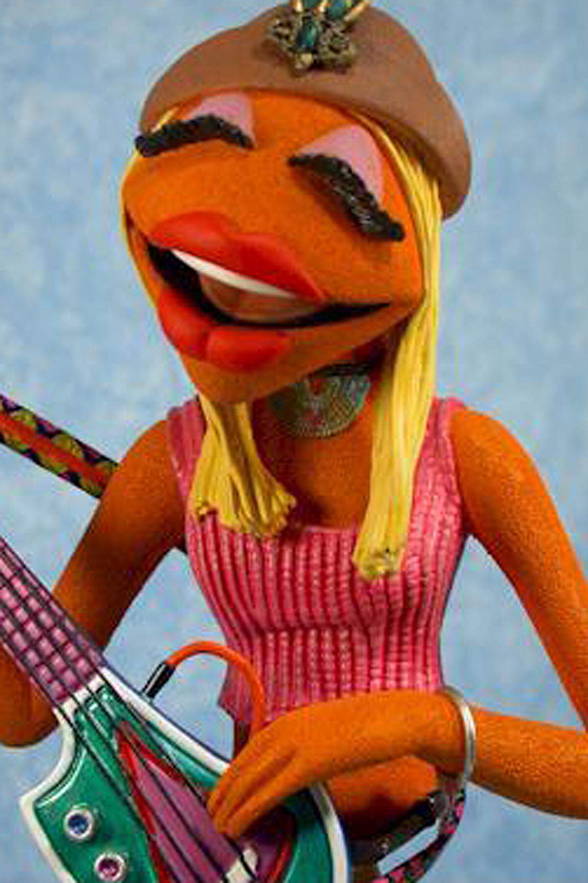 Janice, die Solo-Gitarristin der Muppet-Band, entspricht ...