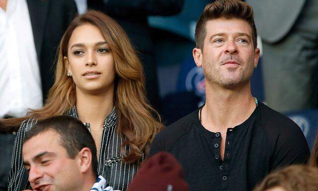 Sänger Robin Thicke und Model April Love Geary