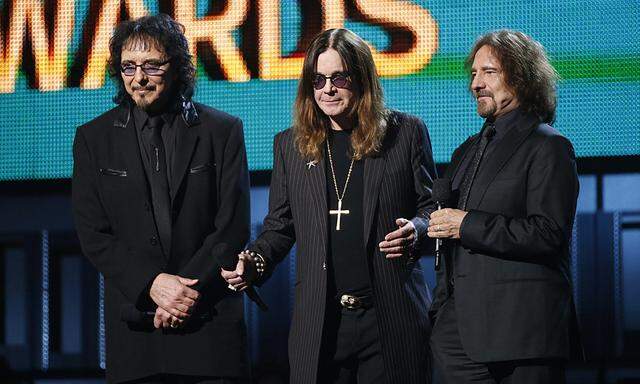 Tommy Iommi, Ozzy Osbourne and Geezer Butler of Black Sabbath introduce a performance by Ringo Star