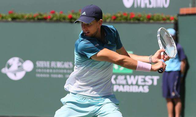 INDIAN WELLS CA MARCH 16 Dominic Thiem AUT hits a backhand during the semifinals of the BNP Pa