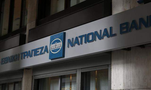 The logo of National Bank is seen outside a branch in Athens